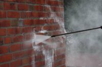 Powerwashing to remove graffiti on monuments and memorials